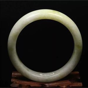 Natural Yellow Green Jade Bangle. 58mm